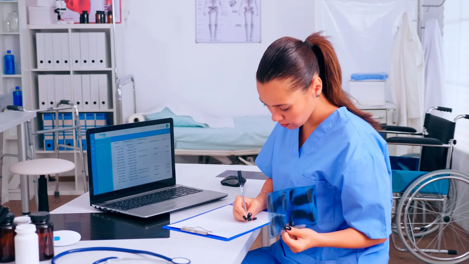 nurse checking x ray result nurse checking x ray result